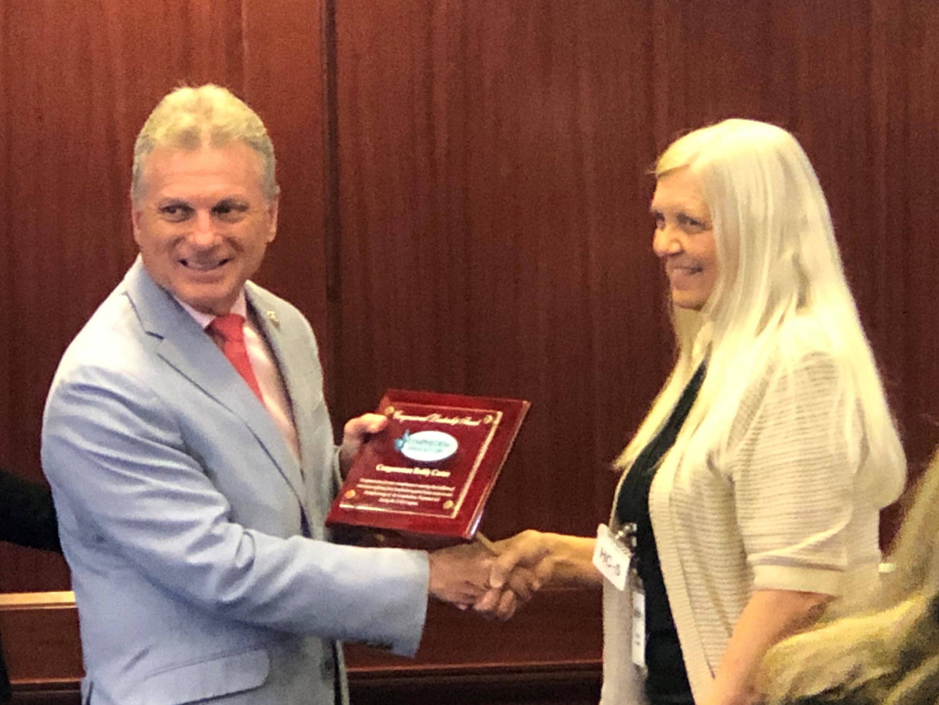 IMG 6474 Debbie presenting plaque to Congressman Buddy Carter on May 23